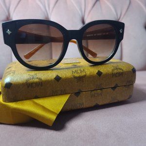 MCM black and orange sunglasses